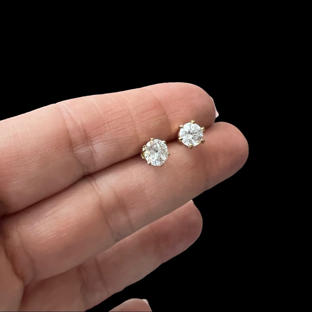 Faux Diamond pierced studs. Gold tone.